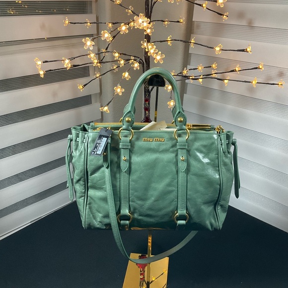 Miu Miu Handbags - NWT Miu Miu, Agave, excellent condition, has original authentication card, tag